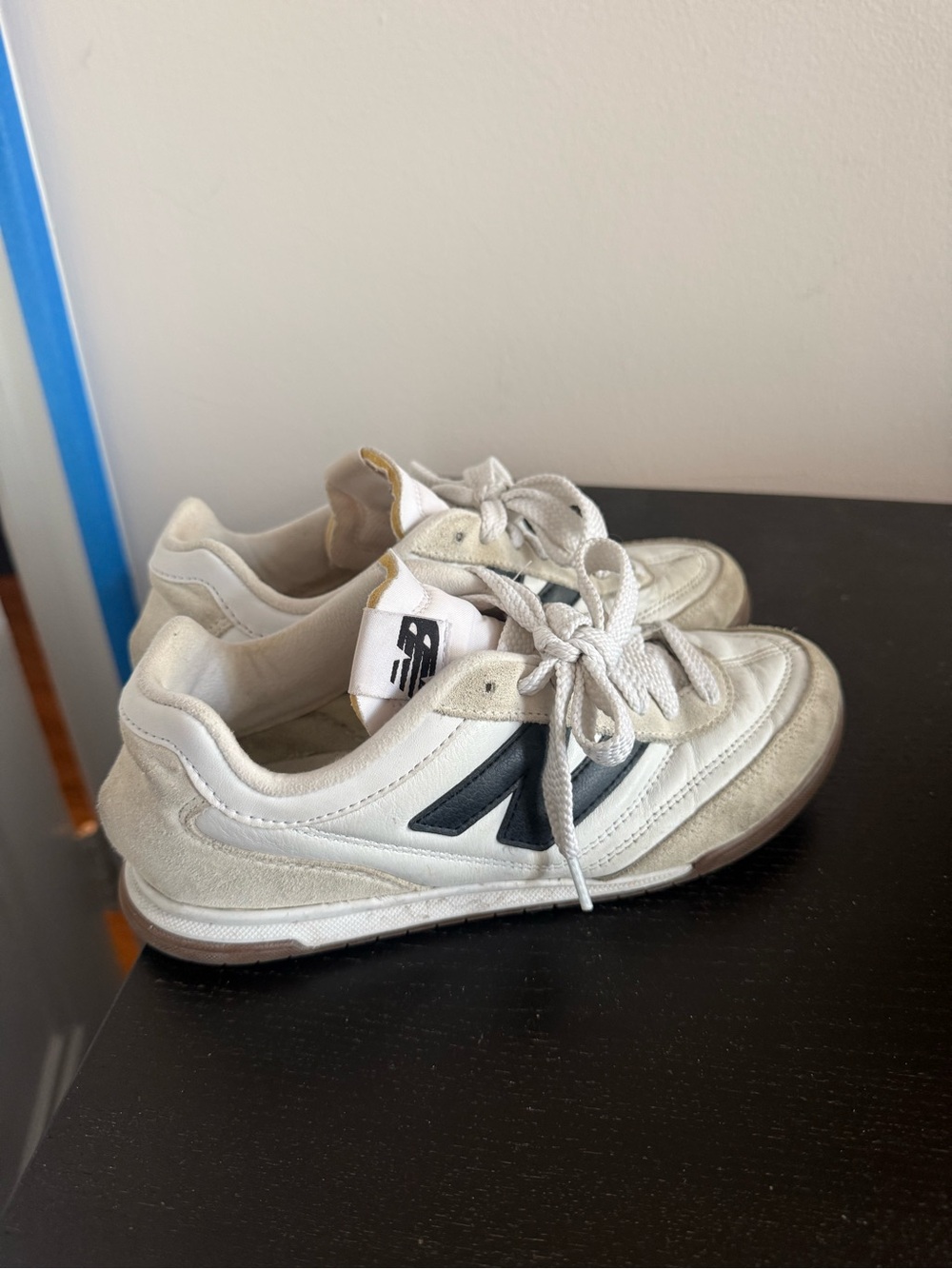 New Balance White Athletic Sneakers with Black Logo
